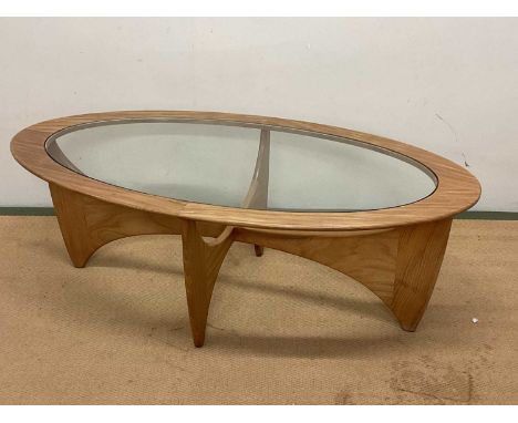 G PLAN; a mid 20th century Astro oval teak and glass coffee table, height 41cm, width 122cm, depth 65cm.Condition Report: Thi