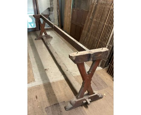 A 19th century stained pine large table base, with cross supports, height 72cm, width 275cm, depth 45cm. Please note: there i