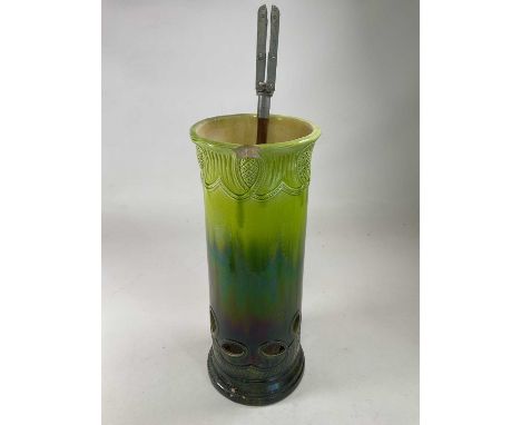 BURMANTOFTS; a green glazed stick stand, impressed marks, height 64cm, also a shooting stick (2).Condition Report: Has a larg