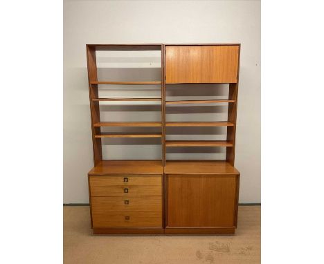 G PLAN; a mid 20th century Form Five teak pair of wall units, one with four drawers, the other with sliding doors and single 