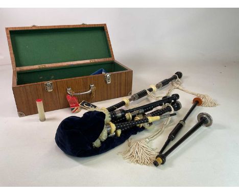 A cased set of cocuswood silver and ivory mounted bagpipes, with chanter, the box bearing label for Knightsbridge Pipe Band a