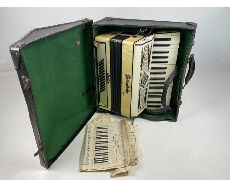 GERALDO; a standard accordion, with case.