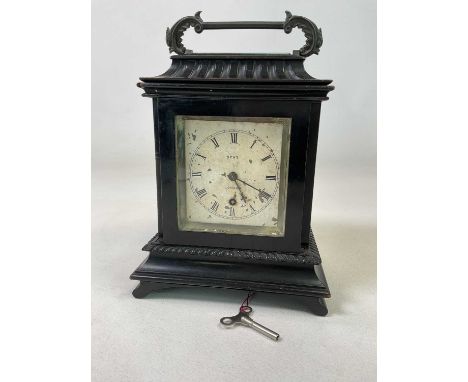 DENT OF LONDON; a late 19th century ebonised oversized carriage clock with cast metal swing loop handle above fluted pagoda c