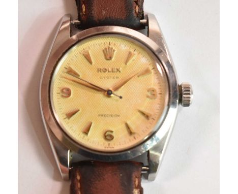 ROLEX; a circa 1959 Oyster stainless steel wristwatch with Arabic numerals and angled arrowhead hour markers, ref: 6426, no. 