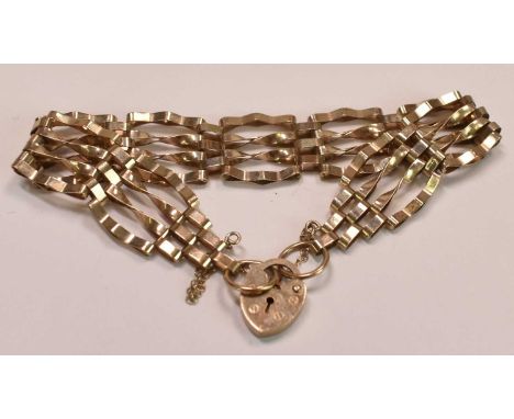 A 9ct yellow gold four bar gate link bracelet with padlock clasp, approx 8.65g.