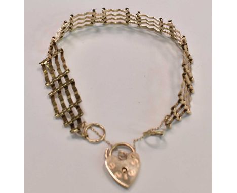 A 9ct yellow gold four bar gate link bracelet with padlock clasp, approx 8.76g.