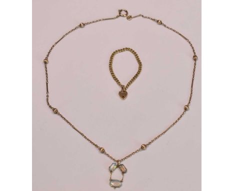 A 9ct rose gold fancy link chain suspending a triple opal set pendant and with additional 9ct yellow gold lengthener chain wi