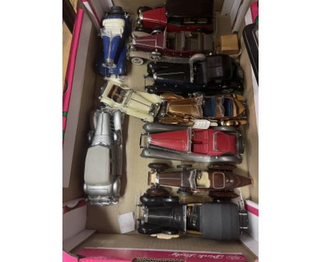 A group of assorted Franklin Mint die-cast model cars, including Rolls-Royce and Bugatti 