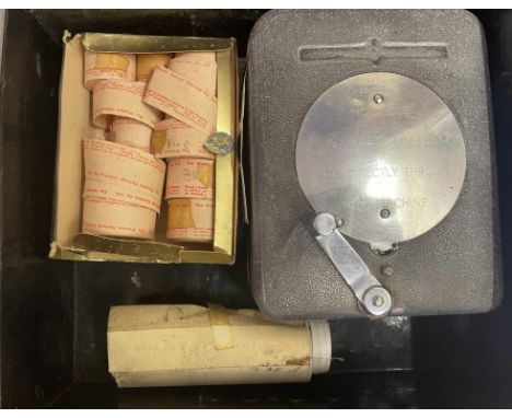 A Bell Punch Company ticket machine, and a small group of tickets, in a tin box 