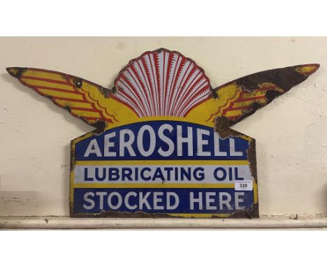 A rare double sided enamel sign, Aeroshell Lubricating Oil Stocked Here, 38 x 72 cmSome loss, one of the wings has been folde