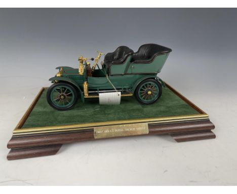 A Precision Models Bugatti Royale Coupe Napoleon, and a Rolls-Royce Silver Ghost, both cased (2)glass and steering wheel brok