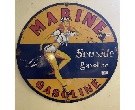 An enamel sign Marine Seaside Gasoline, 60.5 cm diametersome loss/damage 