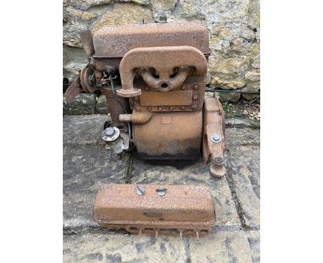 A Morris Minor OHC engine, circa 1928-1932, with a spare cylinder head and manifoldgarage stored, condition unknown 