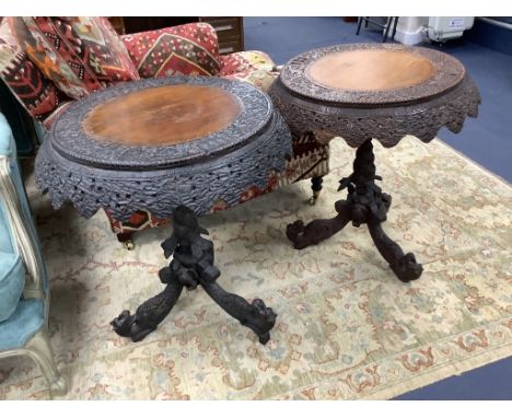 A near pair of 19th century Indian padouk tripod tables, 62cm diameter, height 70cm