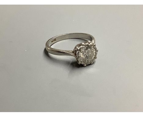 A white metal (stamped platinum) and solitaire diamond ring, size N, gross weight 4.5 g,The stone one proximally 1 carat, Wit