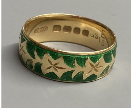 A modern 18ct gold and green enamel band, size P, gross 5.6 grams (enamel a.f.)