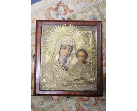 19th Century Russian School. tempera on panel, Icon of the Virgin and Child with silver gilt oklad23 x 19 cm, case overall 28