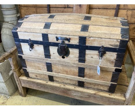 An early 20th century iron bound dome topped travelling trunk, width 87cm, depth 49cm, height 57cm