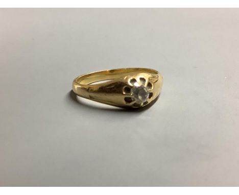 A yellow metal and claw set solitaire diamond ring, size P/Q gross 4.8 g.
