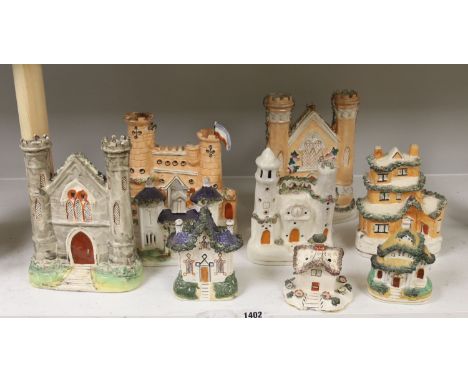 A collection of architectural Staffordshire pottery groups, tallest 22cm