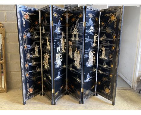 A 1920's - 30s Chinese inlaid mother of pearl six fold screen, each panel 45cm wide, height 183cm72 x 95ins 