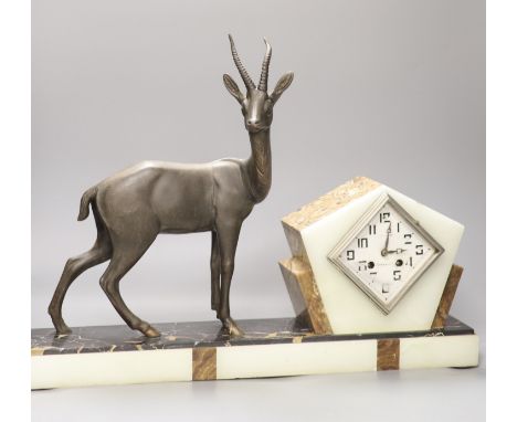 An Art Deco spelter, marble and onyx 'antelope' mantel clock, length 58cm
