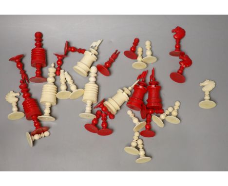 A 19th century bone natural and red bone chess set