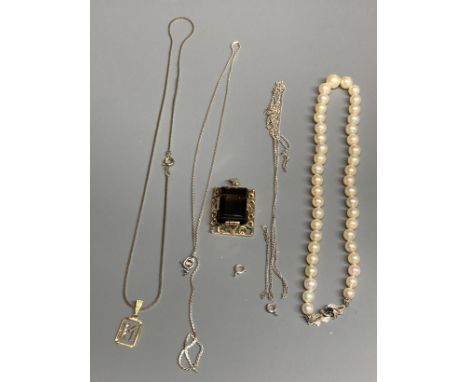 A single strand cultured pearl choker necklace, with 18ct white gold and sapphire set clasp, a 14ct and smoky quartz pendant,