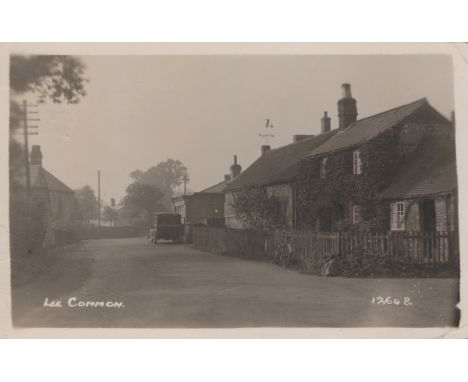 A collection of approximately 234 postcards in three albums, the majority British topographical views, including photographic