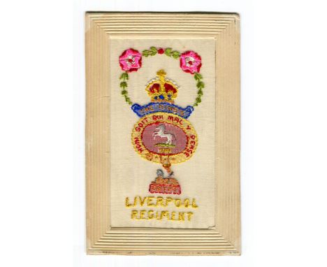 An album containing approximately 52 embroidered silk postcards, including some with regimental crests and badges, including 