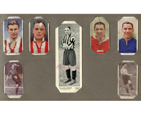 AUTOGRAPHS. An album containing approximately 36 photographs, cigarette and trade cards signed by footballers, including Stan