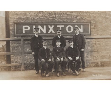 A collection of approximately 500 postcards in two albums and loose, including photographic and printed postcards of railway 