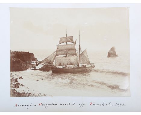 PHOTOGRAPHS. An album containing approximately 82 albumen-print photographs of Madeira, Italy and the UK, circa 1885, leaves 