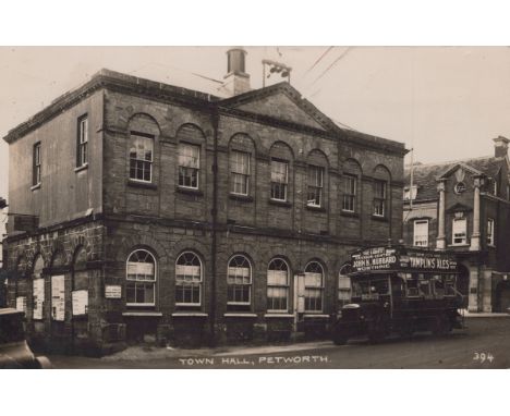 A collection of 48 postcards of Petworth, West Sussex, including photographic postcards titled 'Town Hall, Petworth', 'Petwor