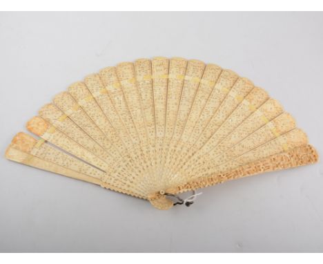 Cantonese ivory fan, carved and pierced blades, 25cm.