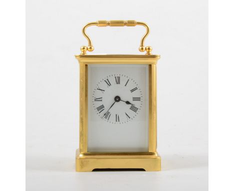 French brass cased carriage clock, white enamelled dial, platform escapement, 12cm.