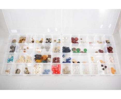 Two trays of vintage buttons to include glass, plastic, embroidered, ceramic, mother-of-pearl mosaic, agate, five silver butt