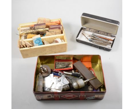 Large quantity of watchmakers tools, equipment, including lamps, radios, paperwork and tins.
