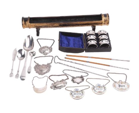A small collection of mixed flatware, napkin rings, decanter labels and a Burmese lacquer holder; to include examples of a Ge