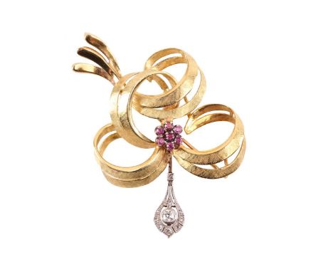 A gem-set bow brooch in 18ct gold, of ribbon form with Florentine finish, embellished with a ruby cluster, and a later added 