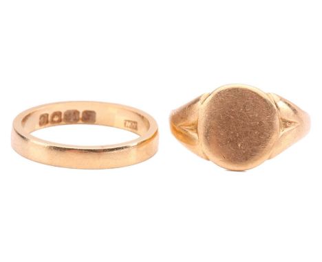 Two 18ct yellow gold rings; to include a plain wedding band in a D-section profile with straight edges, London 1898 with Will