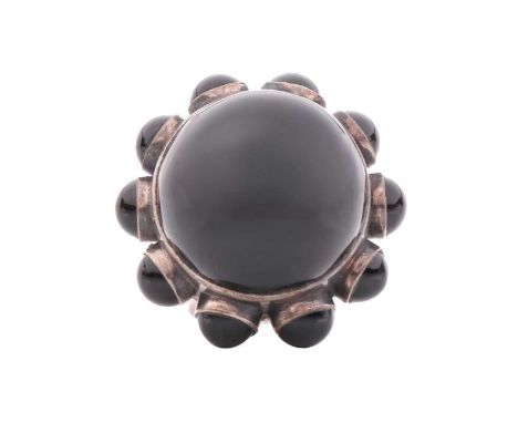 Georg Jensen - a large onyx cocktail ring, encircled with onyx cabochon ornaments around the collet, to a wide flat shank, de