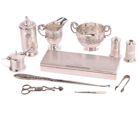 A small collection of silver items including, a rectangular engine-turned cigarette box, London 1964 by S.J Rose &amp; Sons. 