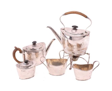 An Edwardian silver five-piece tea service, in the George III style, comprising a spirit kettle, teapot, milk jug, sugar bowl