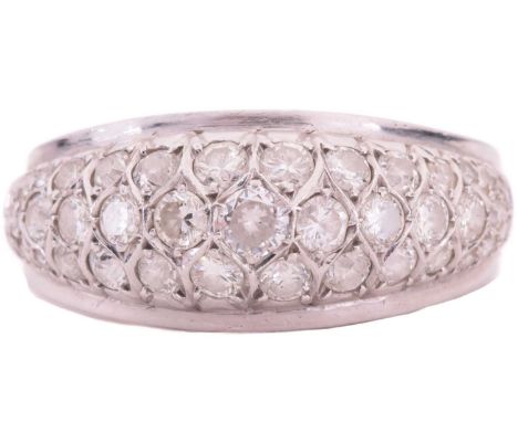 A diamond dress ring, designed as a half hoop set throughout with three rows of round brilliant cut diamonds with a total est