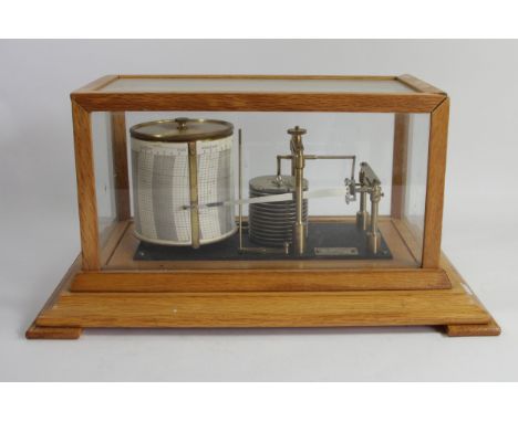 Negritti &amp; Zambra, London, a mid 20th century light oak barograph, serial number R/45191, range 28.31 inhg, lacking ink b