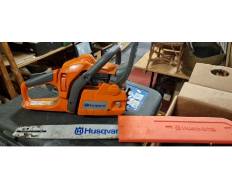 A Husqvarna petrol driven chainsaw, model 435, boxed.