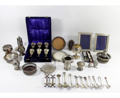 Two silver photograph frames, Birmingham 1921 and 1923, a silver biro, Birmingham 1973, a silver propelling pencil, London 19