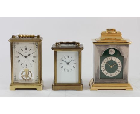 A Thwaites & Reed 8 day English carriage clock, 15cm tall, together with a West German brass cased carriage clock and a Swiss