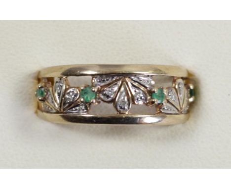 A 9ct gold emerald and diamond dress ring, O, 2.9gm 